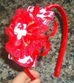 Tiara vermelha laço e flor